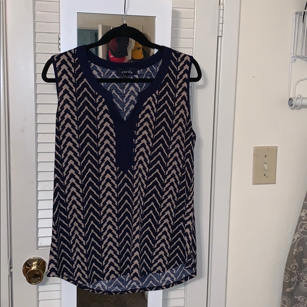 Women’s tan and navy striped sleeveless blouse